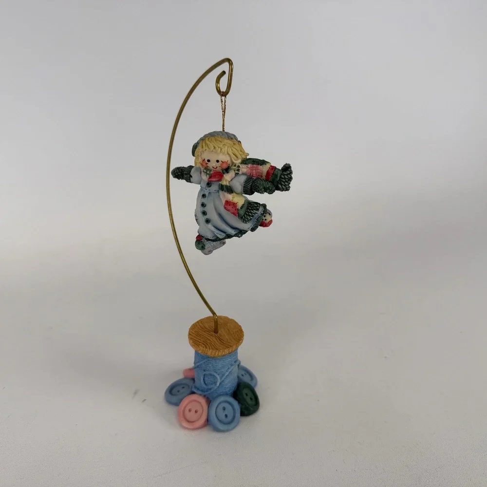 Enesco Cute as a Button Ice Skater Girl Ornament with Spool & Button Base Stand